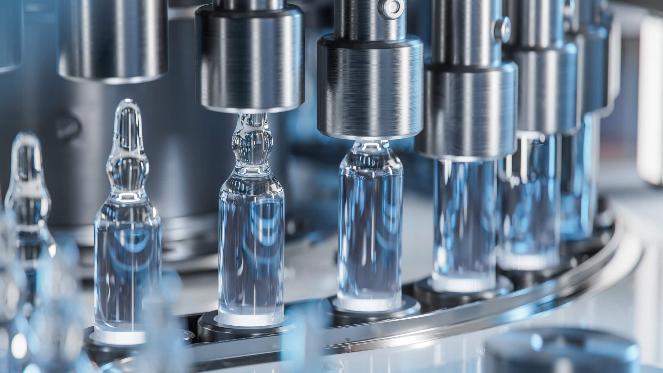 Macro Shot of Medical Ampoule Production Line at Modern Modern Pharmaceutical Factory. Glass Ampoules are being Filled. Medication Manufacturing Process. Glass ampoules being filled
